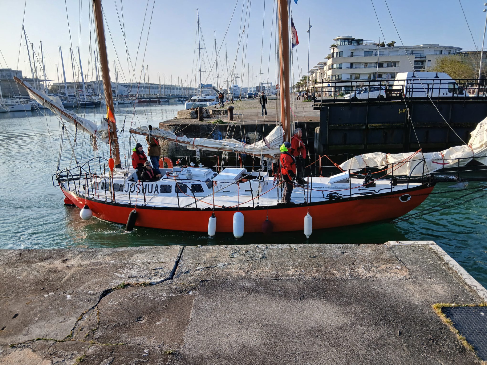 Classic sailing yacht moored alongside a pier in Italy