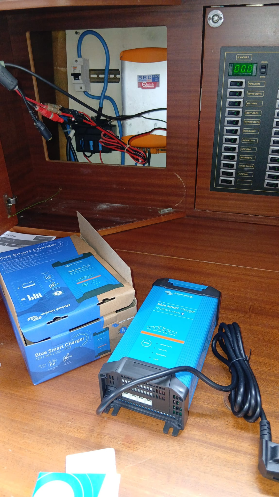 Victron Blue Smart Charger installed on board a sailing yacht